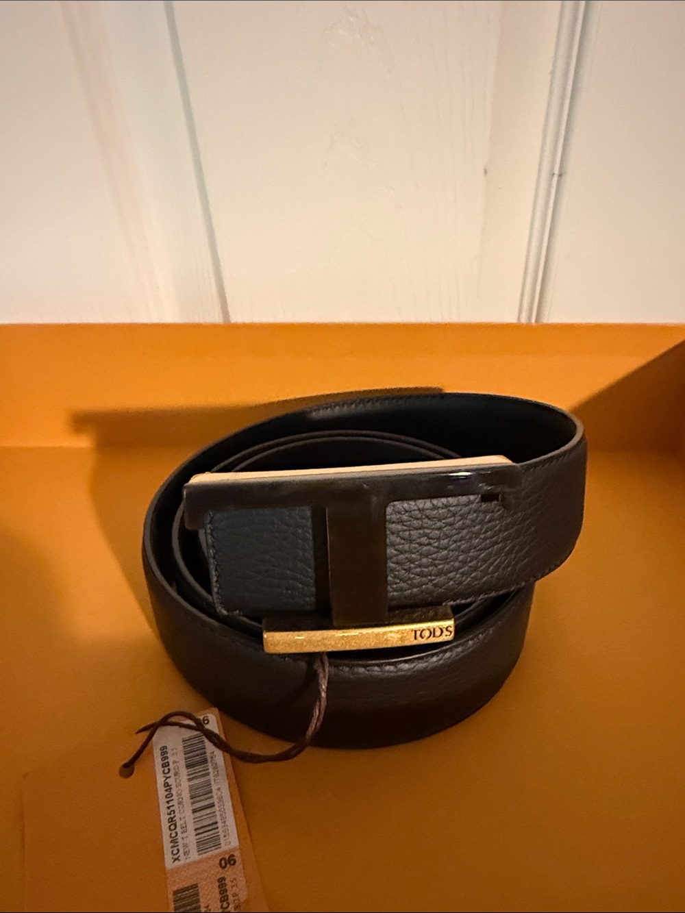 Tod's Black Leather Men's Belt with Gold Accent